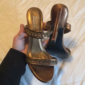 Bronze gold And amber colored shoes